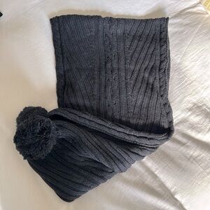 Grey wool scarf with pom poms